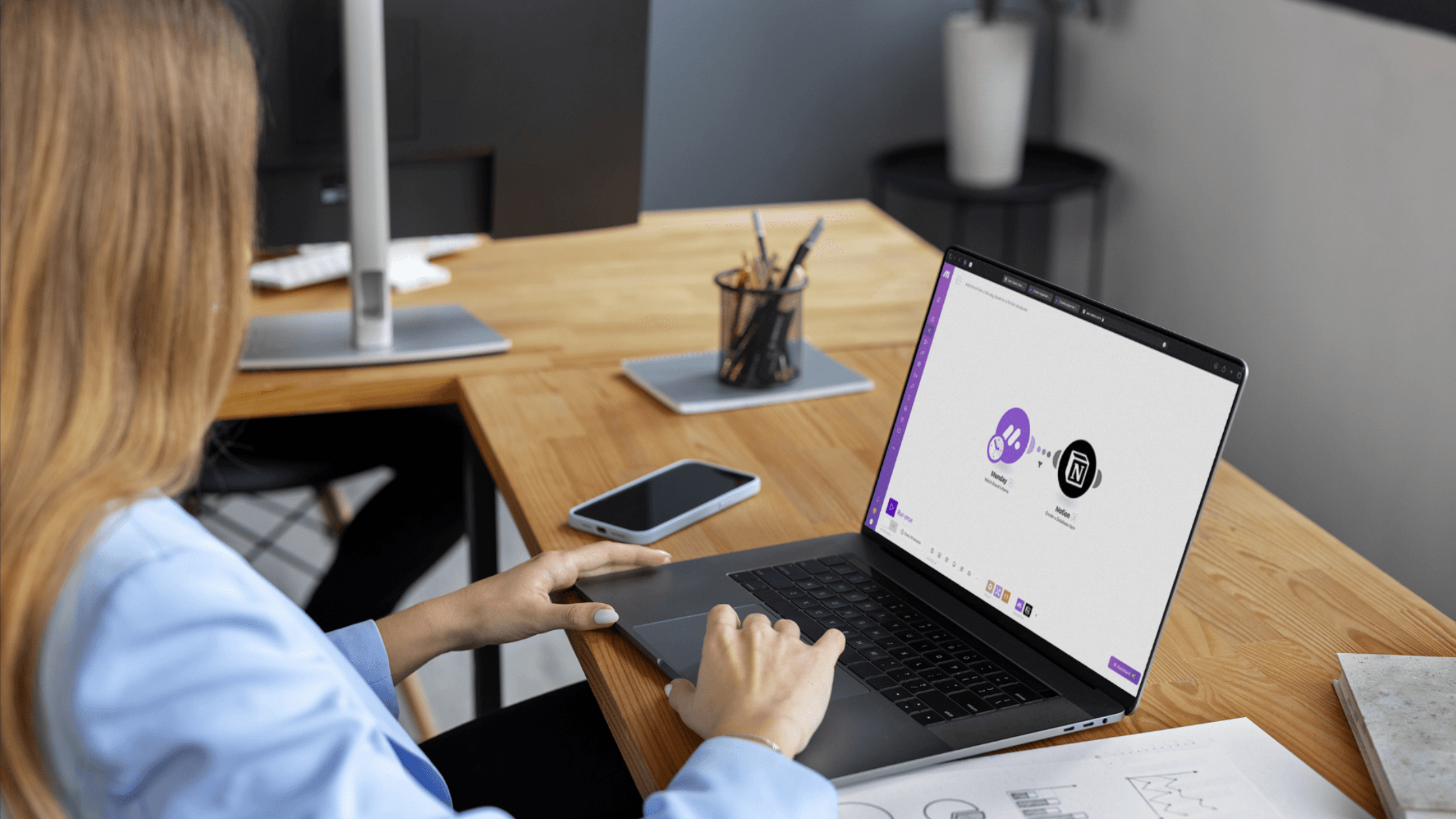 A person using make at her computer